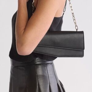 BCBGMAXAZRIA Women's Black Silver Chain Clutch Bag Angled Silhouette NWOT